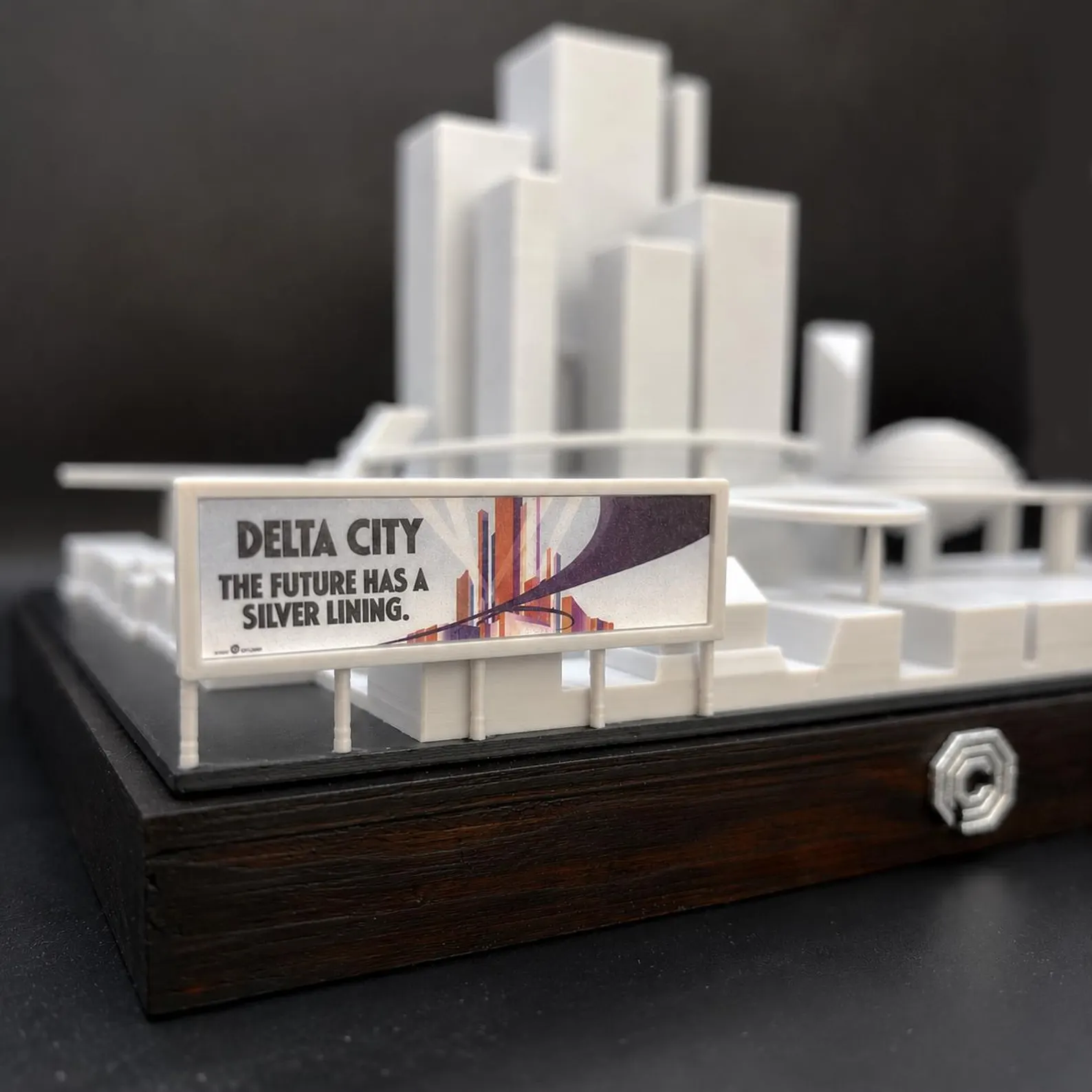 Close-up of the Delta City billboard and display base