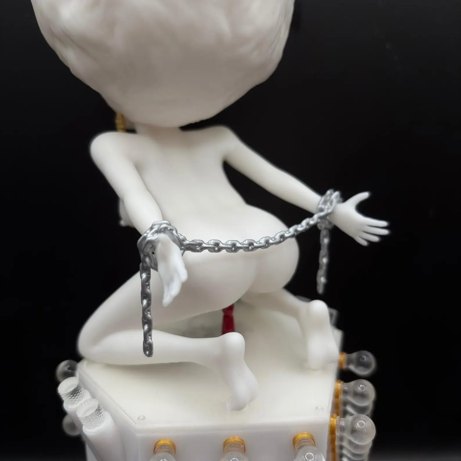 Rear view of the Korova Milk Bar Maid showing the silver-coloured wrist chain